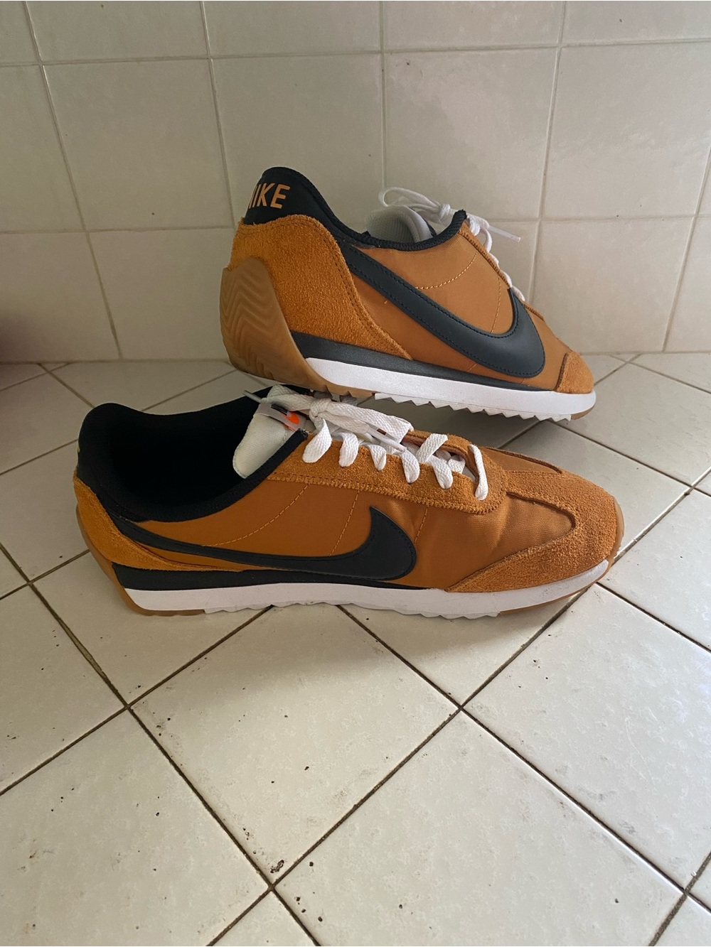 Nike Orange and Black Low-Top Runner Sneakers